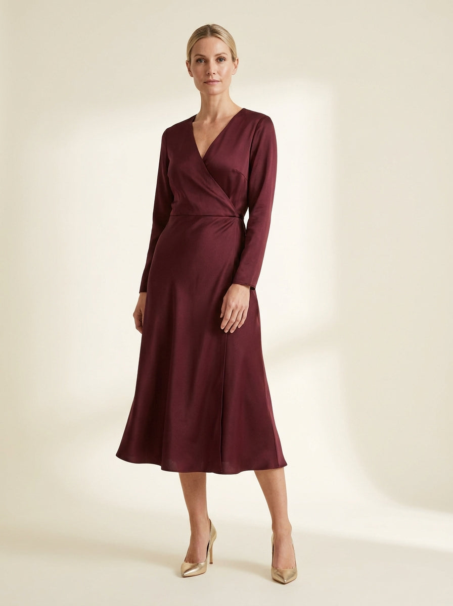 deep burgundy satin-touch wrap midi dress with subtle luminous sheen — front view